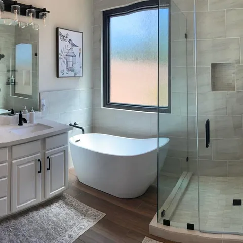 This pretty remodel of a Primary Bath … makes me want to sing !