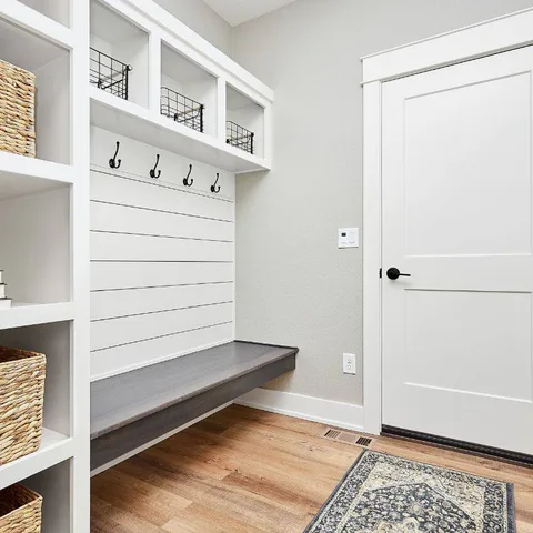 Start your day right—with an entryway that works. Add a bench, hooks, and a drop zone for keys and mail.