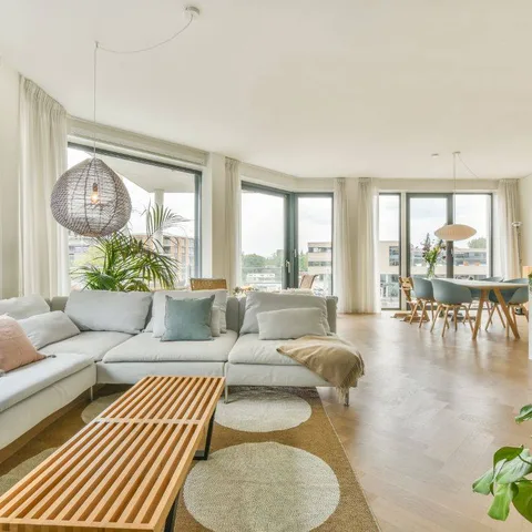 Keep it cool this July with laid-back, breathable living room vibes. 🛋️