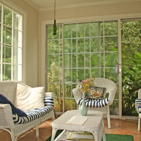 Have a sunroom or bright nook? Turn it into your July escape zone. ☀️