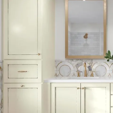 Cabinetry isn’t just for the kitchen! This elegant primary suite feels custom and luxurious, created with Waypoint Living Spaces’ door style 470F in Painted Biscotti Glaze. 🛁👗👕