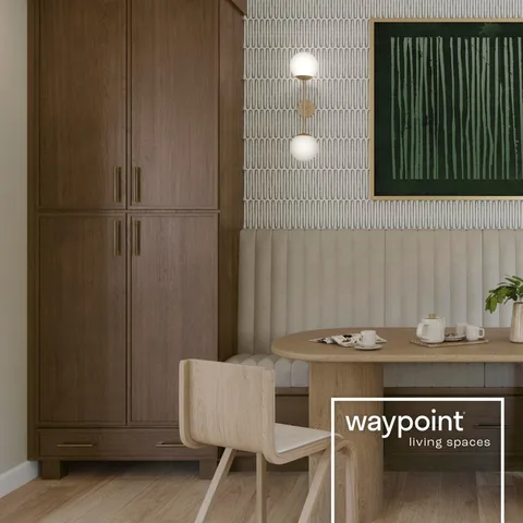 This cozy dining nook features rich cherry wood cabinetry adding timeless warmth and sophistication. Paired with soft neutral tones and minimalist furniture, the natural beauty of 
