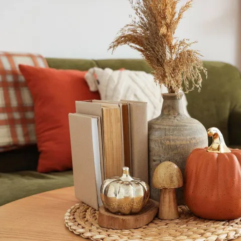‘The magic of autumn is found in the little things—soft lighting, warm colors, and cozy corners that make a house feel like home.’ 🍂
