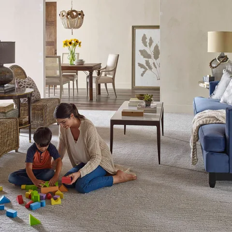 Cherish every playful moment! 💖 Redwood carpet creates a warm, inviting space for games, giggles, and all the precious memories with your little one in the living room. ✨