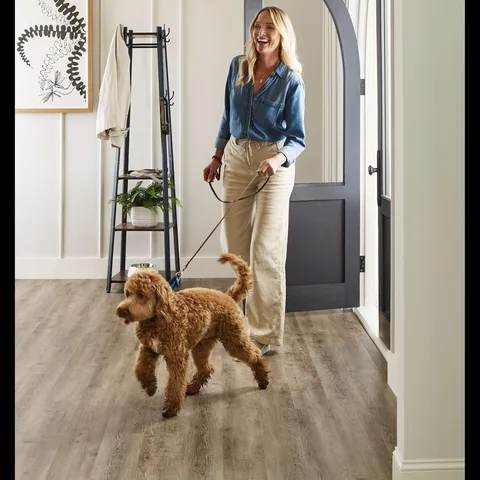 Home sweet home! 🐾 Lifestyle hard surface handles muddy paws with ease, while the soft Smooth Sailing carpet offers instant comfort. ✨