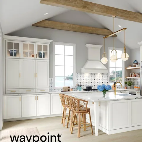 A stunning white kitchen is sure to impress. Adding colorful decor and tiles to your kitchen will add pops of color. To complete the look, use accent lighting fixtures.