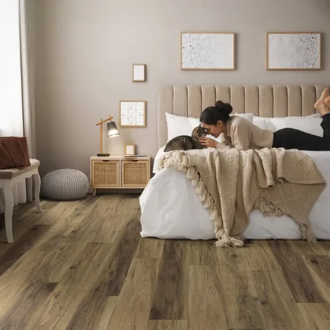 Bring ultimate warmth and quiet into your favorite spaces with the beautifully soft PureGrain Comfort WPC flooring in Elevate Atlus.