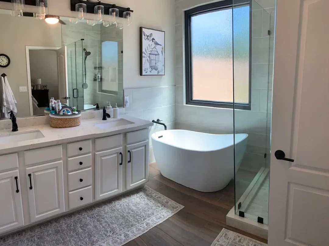 Remodeled bathroom with freestanding tub and vanity – Bathroom Remodeling in Sun City, AZ