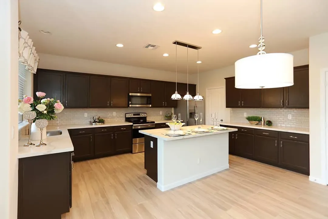 Remodeled kitchen with white island and dark cabinets – Kitchen Remodeling in Gold Canyon, AZ