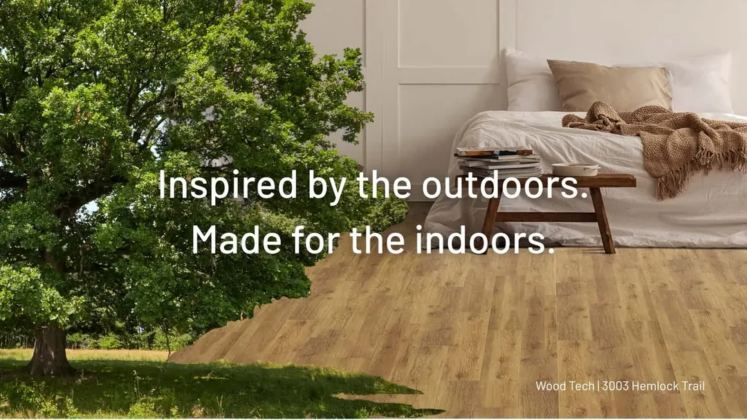 Warm wood-look laminate bedroom flooring in a product inspiration graphic from the Cost Plus 20 collection