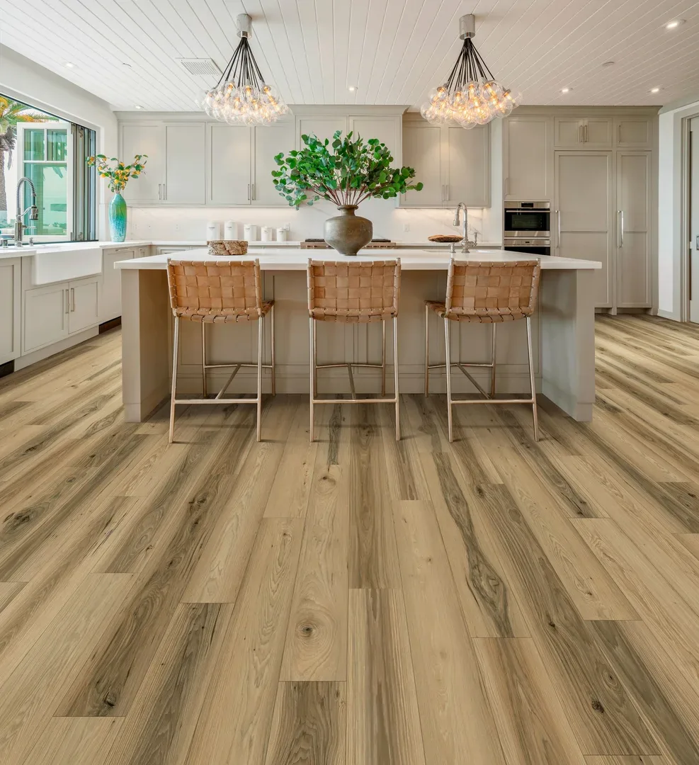 Wood-look flooring in a bright kitchen, shown as design inspiration from the Cost Plus 20 collection